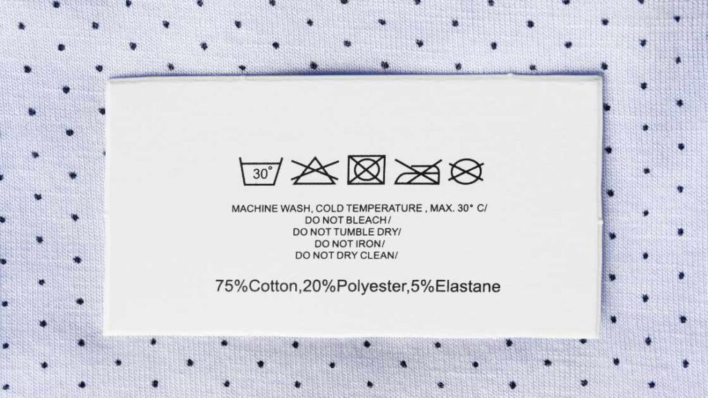 An illustration of care label on a garment representing the query: How to wash sublimation shirts?