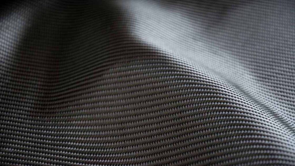 A close up image of nylon fabric texture representing the query: Is Nylon Stretchy? Or Is nylon stretchable? Or Is nylon stretchy? Or Can you stretch nylon? Or How to stretch nylon?